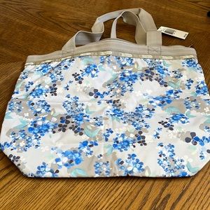LeSportsSac zippered tote with blue floral design.  Still with tags!